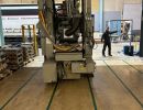Industrial Machinery in a Factory with Warehouse Background and Equipment