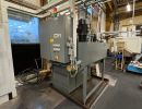 Industrial Machinery in a Factory Production Environment with Overhead Cabling