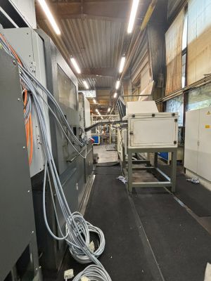 Industrial Factory Interior Showing Machines and Equipment in Warehouse Setting