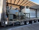 Industrial Machinery Loaded on a Truck in an Open Factory Yard