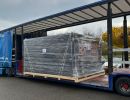 Large Cargo Secured on Open Truck During Overcast Weather for Freight Shipping