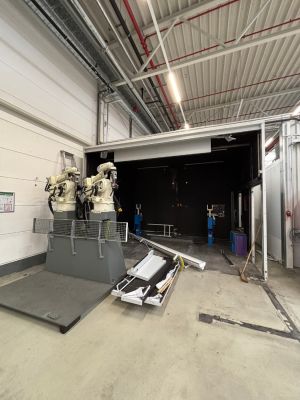 Industrial Setup With Machinery in Robotics Facility Featuring Equipment and Spare Parts