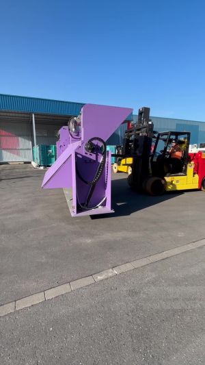 Forklift Handling Industrial Equipment in an Outdoor Warehouse Facility