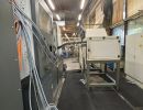Industrielles Fabrikinterieur mit Maschinen und Ausr&uuml;stungen in einer Lagerkulisse